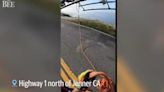 Video: Crews save man thrown from truck that flew off California cliff