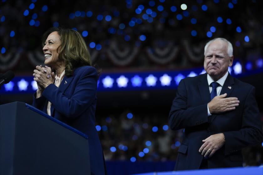 Harris, Walz emphasize 'freedom' and 'joy,' and press attacks on Trump, Vance in raucous first rally