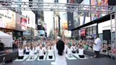 Yogis celebrate the solstice with Times Square takeover