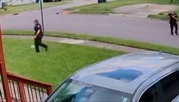 Surveillance video shows exchange of gunfire between Ohio officers, man armed with rifle