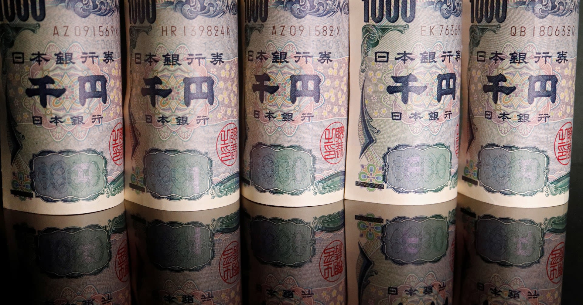 Yen jumps on suspected intervention, sterling hits one-year high