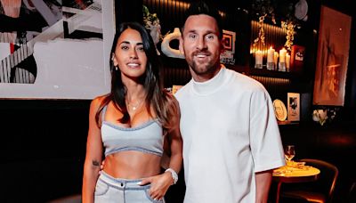 Lionel Messi and Antonela Roccuzzo mobbed by fans as star heads out
