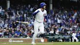 Craig Counsell gives Cubs' Cody Bellinger his flowers after 4 for 5 return from IL