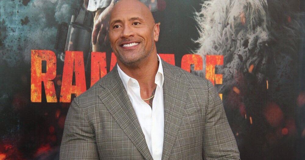 Dwayne Johnson remembers childhood dreams of becoming a country star as he tears up over late father