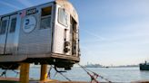 Bon voyage: Old subway cars float off across New York Harbor