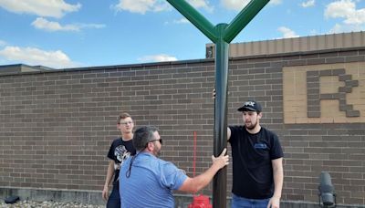 Richland Community College students build feeding station for Scovill Zoo camels