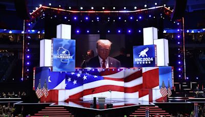 Trump makes dramatic appearance at RNC just days after being shot during assassination attempt