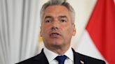Austrian chancellor to remain in government coalition despite his minister's controversial EU vote