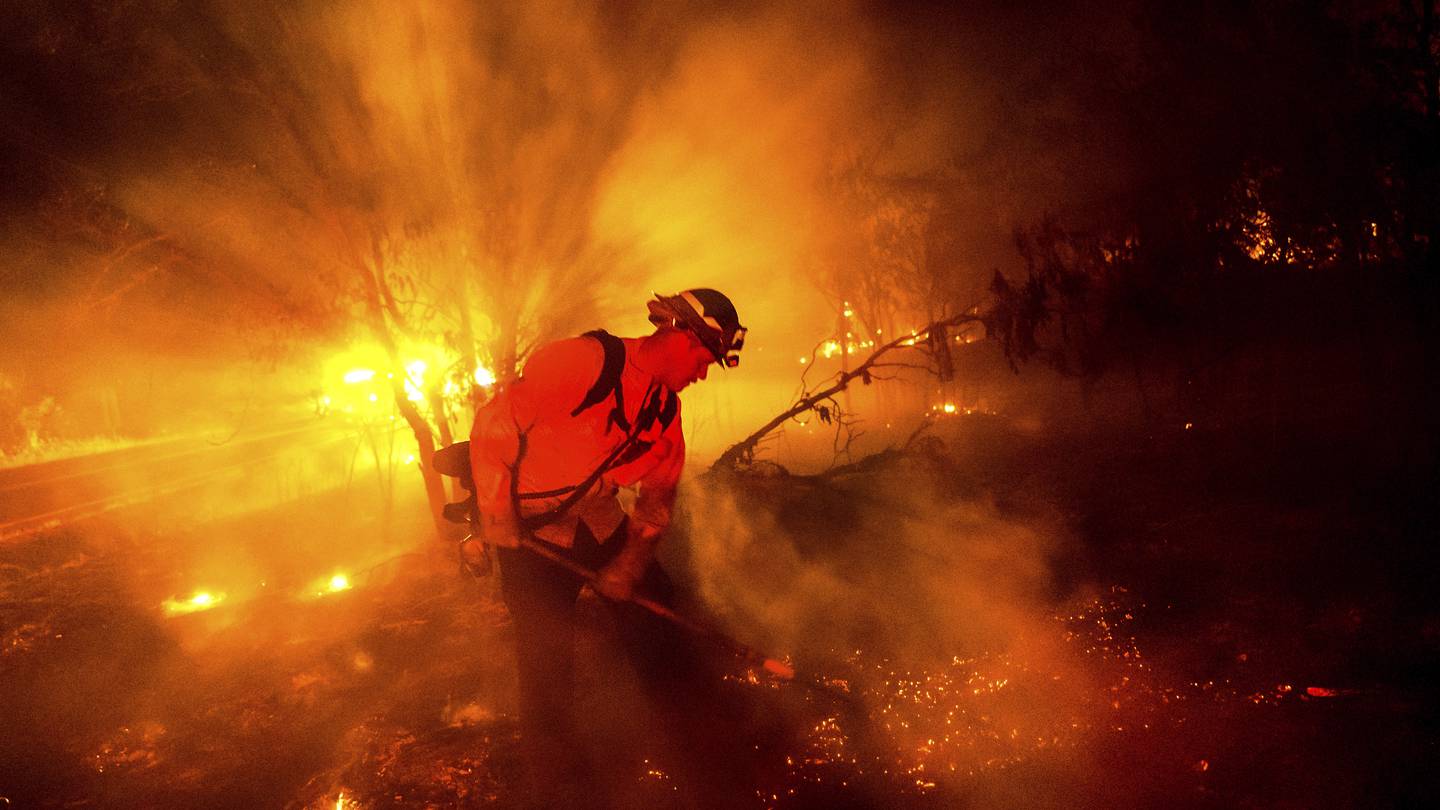 Firefighters gain ground against Southern California wildfire but face dry, windy weather