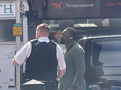 Derek Chisora speaks to police after he was filmed headbutting a rider