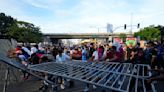 Protesters march in Panama against the contract extension for a huge copper mine