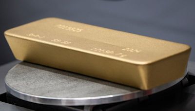 Gold gains ground as investors eye US data for Fed clues