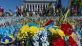 A precious moment in time of war: Flowers for a wife and daughter coming home to Ukraine