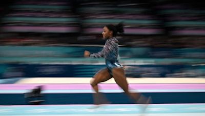 US star Biles shines despite being knocked out of bars final at Paris