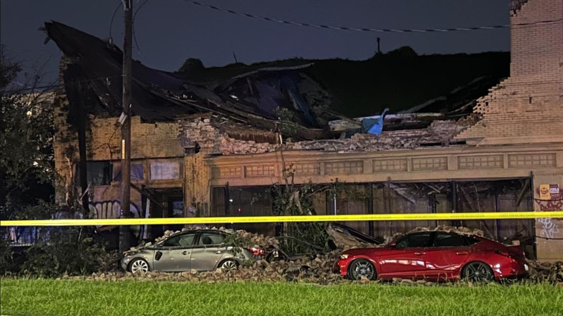 Central City building collapses, cars covered in debris