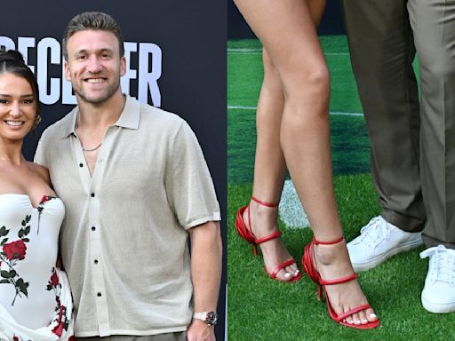 Kristin and Kyle Juszczyk Showcase Contrasting Footwear Styles in Valentino Strappy Heels and White Sneakers at Netflix’s ‘Receiver’ Premiere