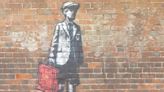 Banksy in Bucks? Painting of boy holding ministerial box appears near Marlow school