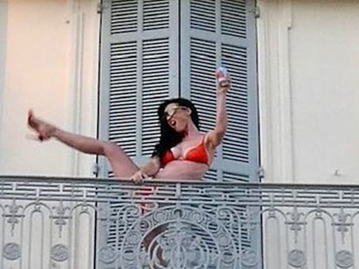 Katy Perry Does Hotel Balcony High Kick in Bright Orange Bikini: 'I'ma Get Your Heart Racing'