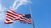 Why are flags at half-staff on Friday in Virginia?