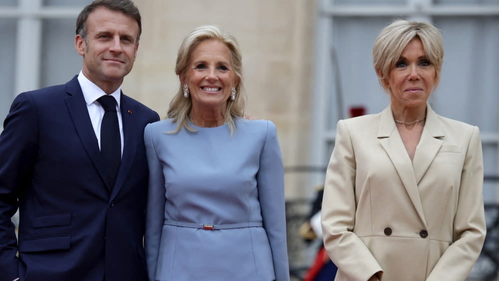 Jill Biden Continues Her Blue Style Streak and France’s First Lady Brigitte Macron Favors Louis Vuitton Coat...