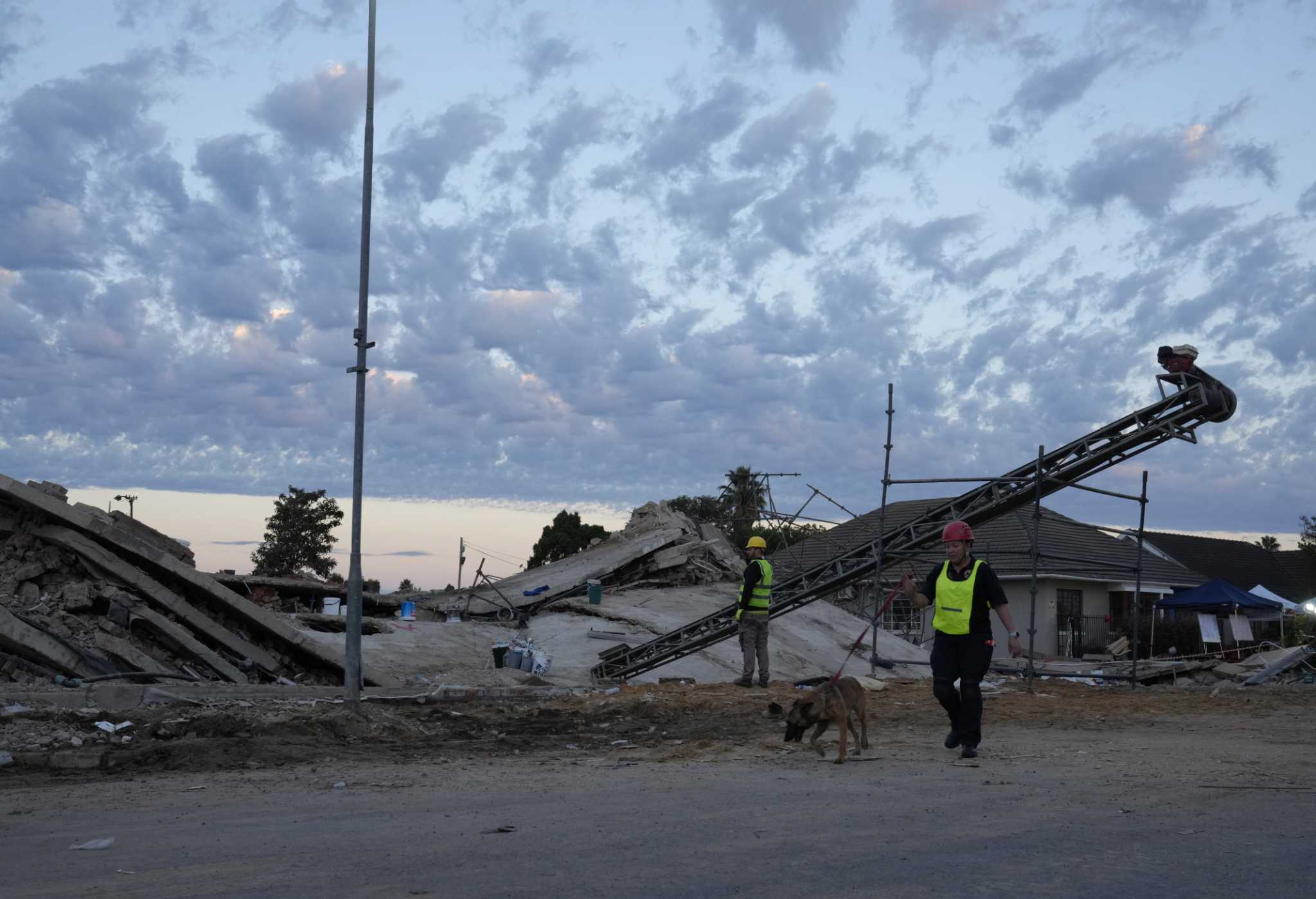 Dozens still missing after Monday's South Africa building collapse. 7 confirmed dead