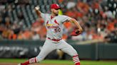 Adam Wainwright finally earns his 199th victory, and Cardinals top AL-leading Orioles 5-2