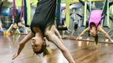 Aerial Yoga Can Help You Finally Nail Your Inversions