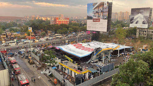 Fourteen killed and dozens injured after Mumbai billboard collapse