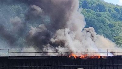 Railroad bridge over Potomac River closed to rail traffic after fire in middle of bridge