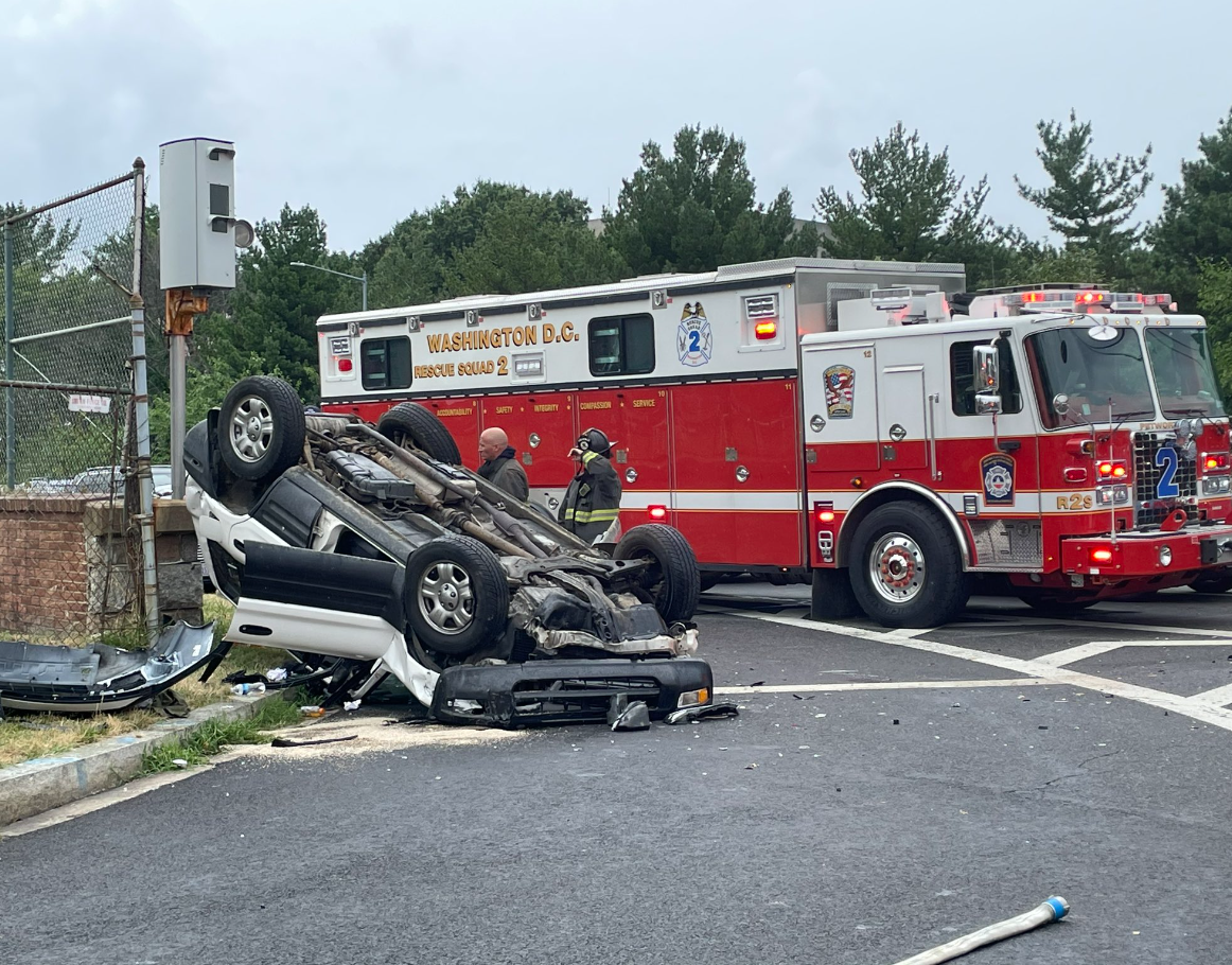 Vehicle flips onto sidewalk in triple-vehicle collision in Northeast DC