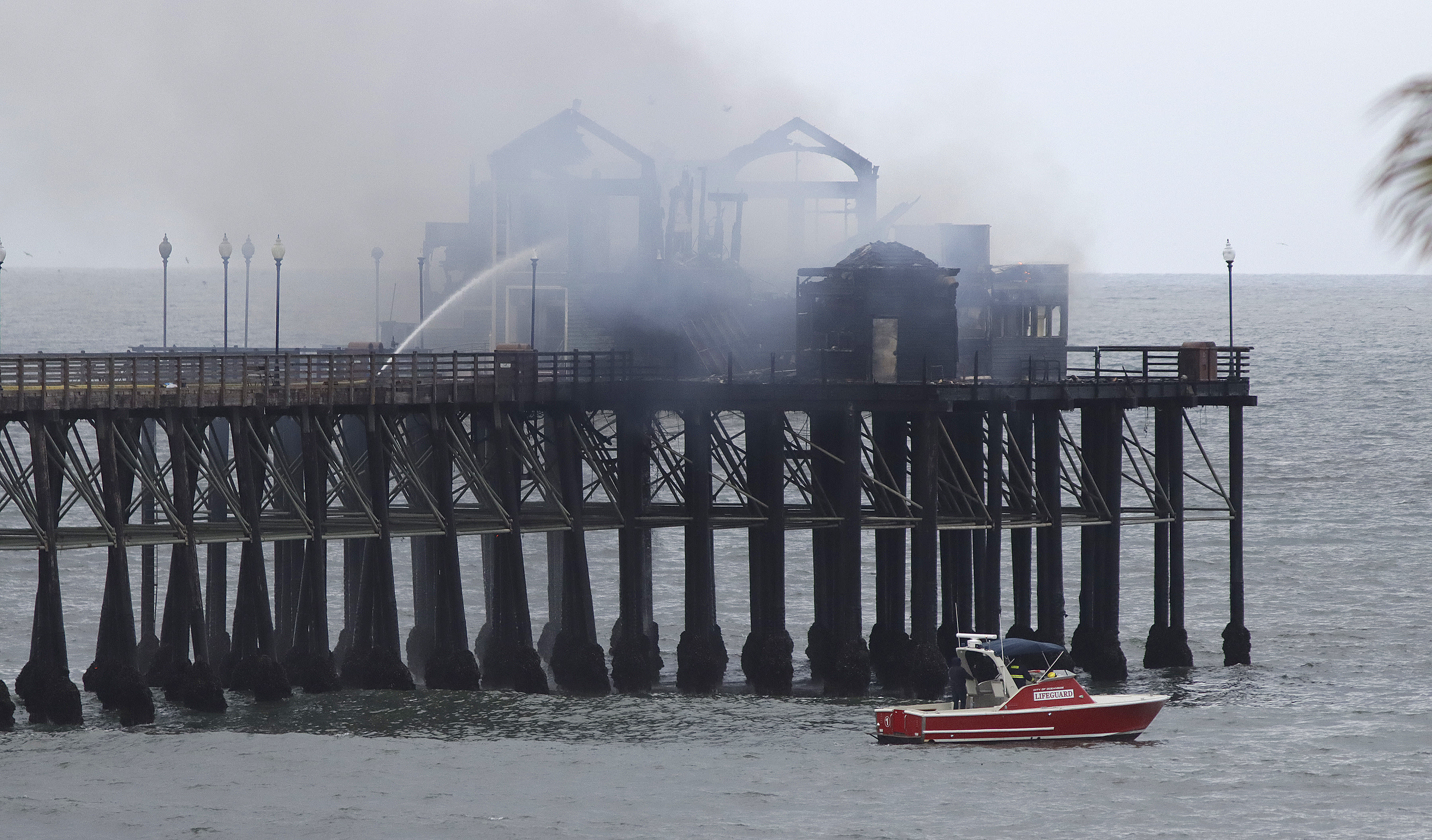 Latest on Oceanside Pier fire: Crews managing hot spots, but structure is stable