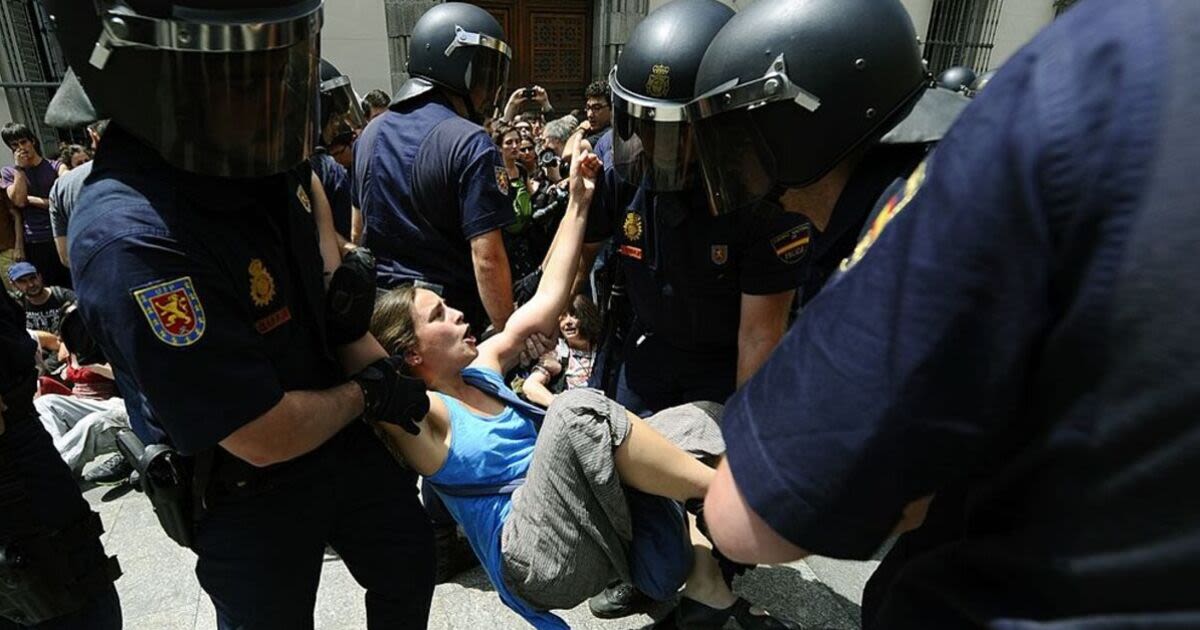 Spanish fury as holiday protest descends into chaos after homeowner evicted