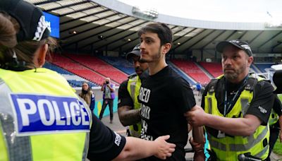 Police charge 24-year-old man over goalpost protest at Scotland v Israel match
