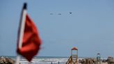 Some in Mexico Take Precautions for Beryl, While Others Enjoy the Beach