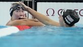 American swimmer Torri Huske edges teammate Gretchen Walsh by just .04 seconds in 100 butterfly
