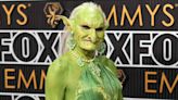 Mysterious Green Goblin Puzzles Viewers on the Emmys Red Carpet — But Who Is the Reality Star Behind the Look?