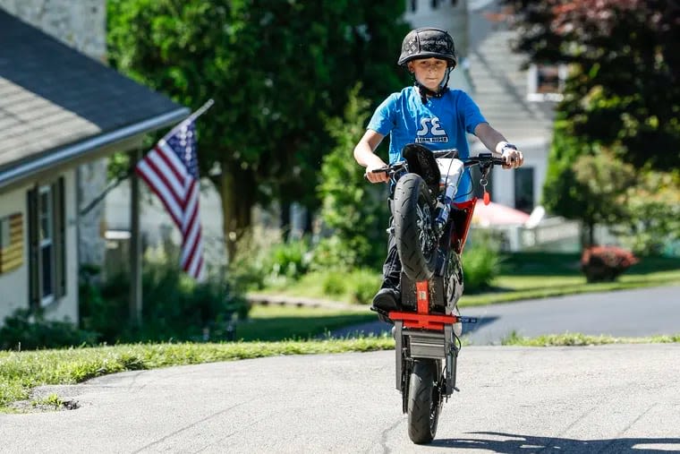 He’s 11 and makes $100,000 a year riding his bike in the suburbs. Haverford police are not pleased.