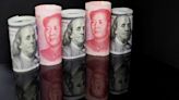 Dollar eases against major currencies amid rate, economic concerns; yuan strengthens