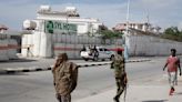 Loud explosion is heard as Somali militant group says its fighters have attacked a hotel in capital