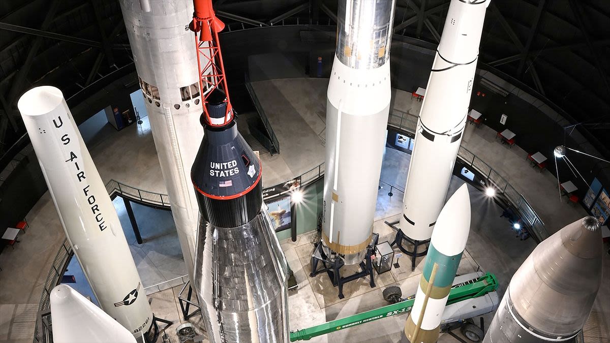 Restored Atlas rocket erected on display as Mercury astronaut's ride to orbit