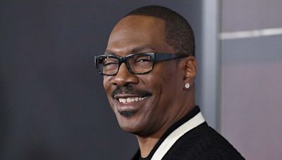 Eddie Murphy Poses for Rare Family Photo With Fiancée and 3 of His Daughters on the Red Carpet