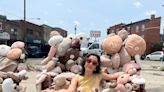 An artist set up a 'boob garden' in an empty Philadelphia lot. Locals come to see 'the titty chairs,' and leave searching for meaning.