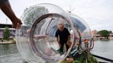 Message in a Bottle? No, It’s a Man Doing Performance Art at the Paris Olympics | Artnet News