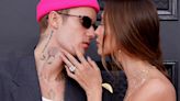 Pregnant Hailey Bieber blooms in bump-revealing dress as Justin Bieber looks 'so in love'