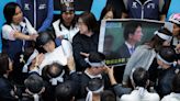 Thousands protest against contentious Taiwan parliament reforms