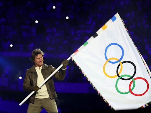 Tom Cruise’s Dive into the Paris Olympics Closing Ceremony Follows a Long History of Daring Stunts