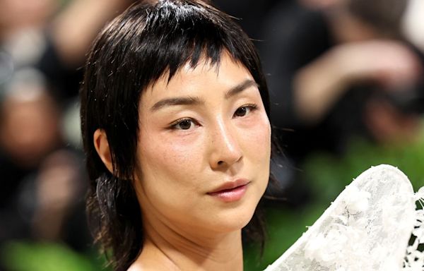 Watch Greta Lee Realize In Real Time That She Can't Talk Or Eat In Met Gala Gown