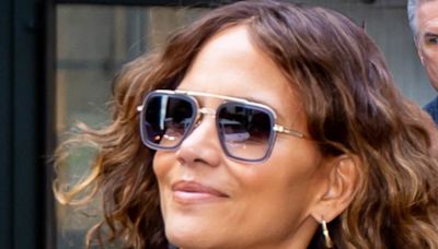 Halle Berry cuts a stylish figure in snakeskin with partner Van Hunt