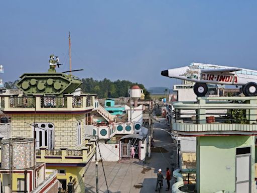 The Indian villages with rooftop sculptures of planes, tanks and cars