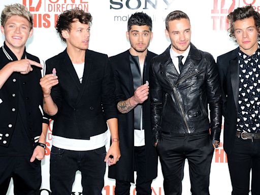 One Direction star spotted on night out with soul singer at burger restaurant